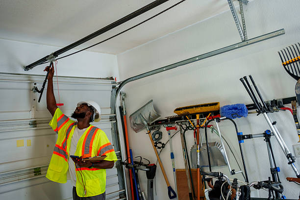 Professional Garage Door Installation technician working in Harwich Port, MA
